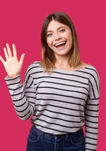 Smiling young woman waving hello