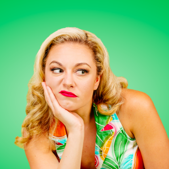 Woman with chin resting on hand
