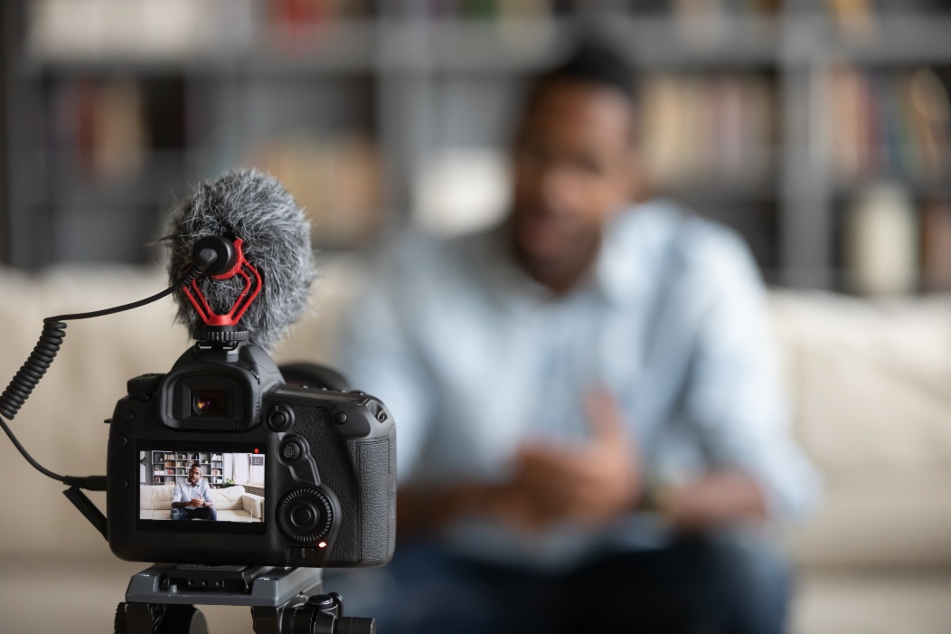Man speaking to a camera