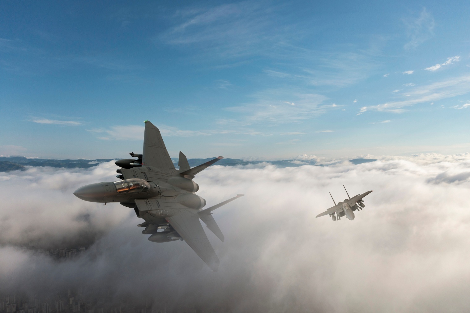Fighter jets above the clouds