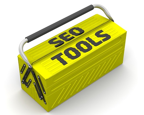 A bright yellow toolbox with a black handle is labeled SEO tools